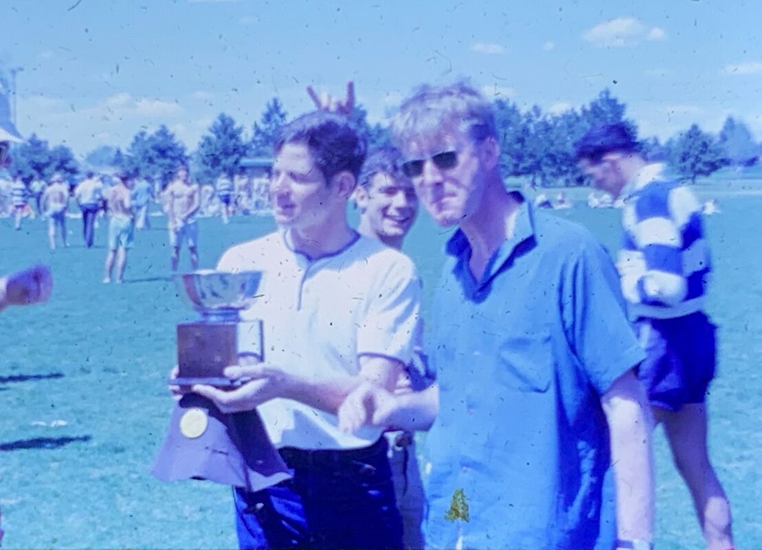 Alan Osur and ? with the Coors Cup